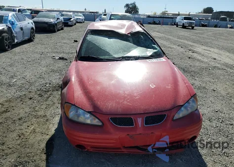 1999 Pontiac Grand Am Se from USA, damaged, VIN 1G2NE52E7XM780440